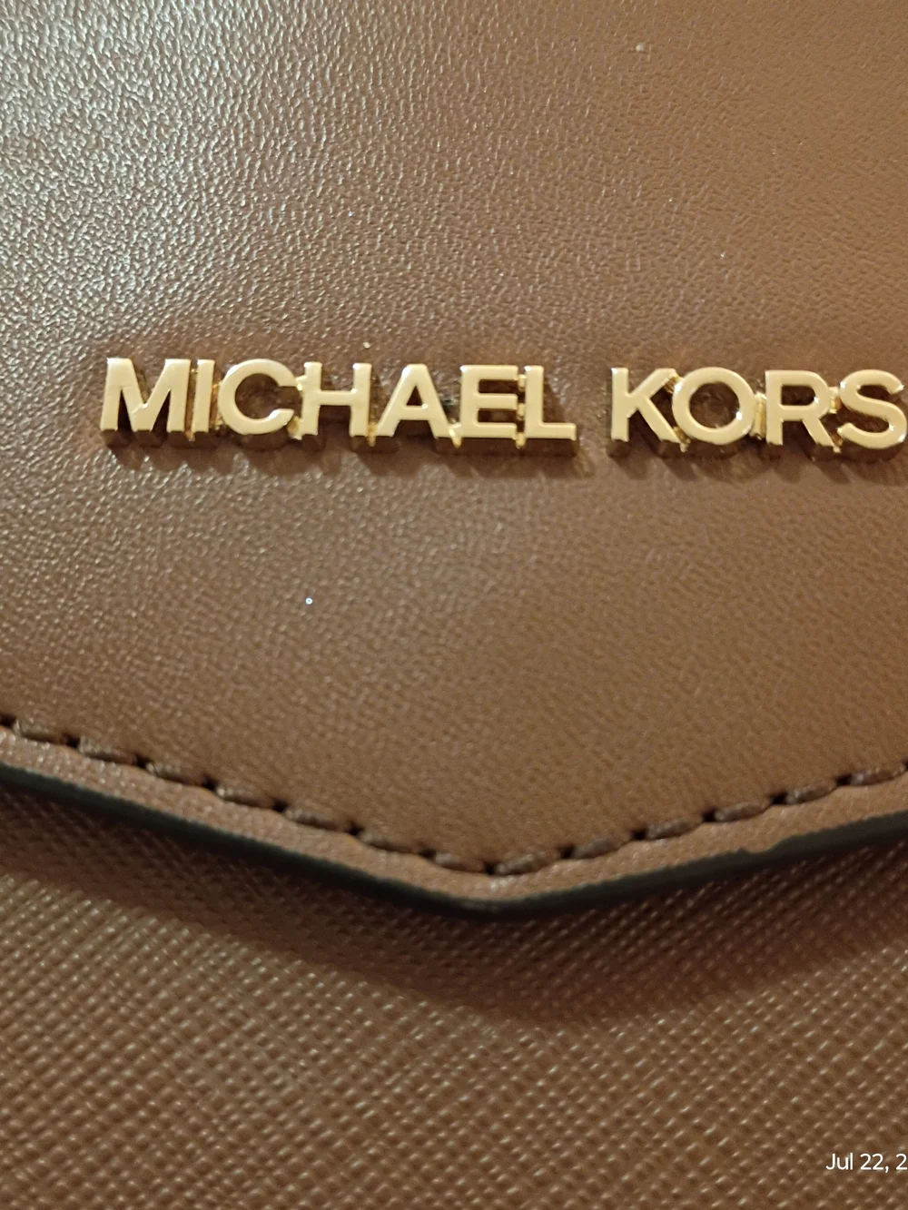 Michael Kors tan leather envelope clutch with gold logo